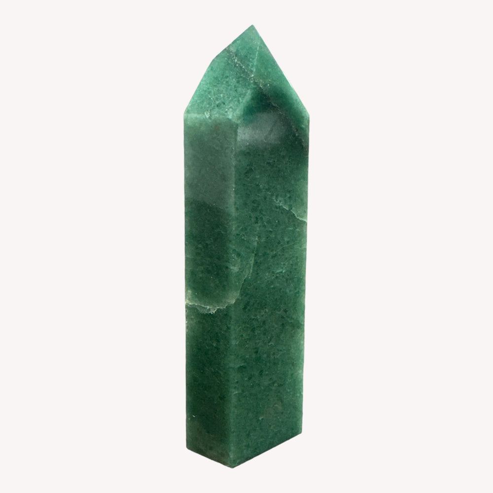 Aventurine crystal generator captured in a side angle shot, emphasizing its unique shape and vibrant green hues. The natural variations and textures make it a captivating addition to any crystal collection.