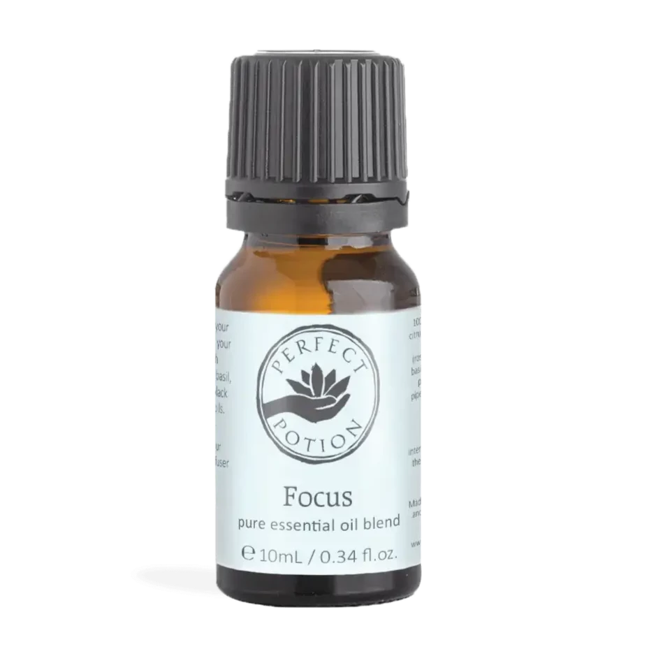 Bottle of Focus Blend Essential Oil – a refreshing mix of lemon, rosemary, basil, peppermint, and black pepper. Crafted to enhance concentration and boost memory. Ingredients: lemon, rosemary, basil, peppermint, and black pepper essential oils. Add 3-5 drops to your diffuser for a sharp and focused mind
