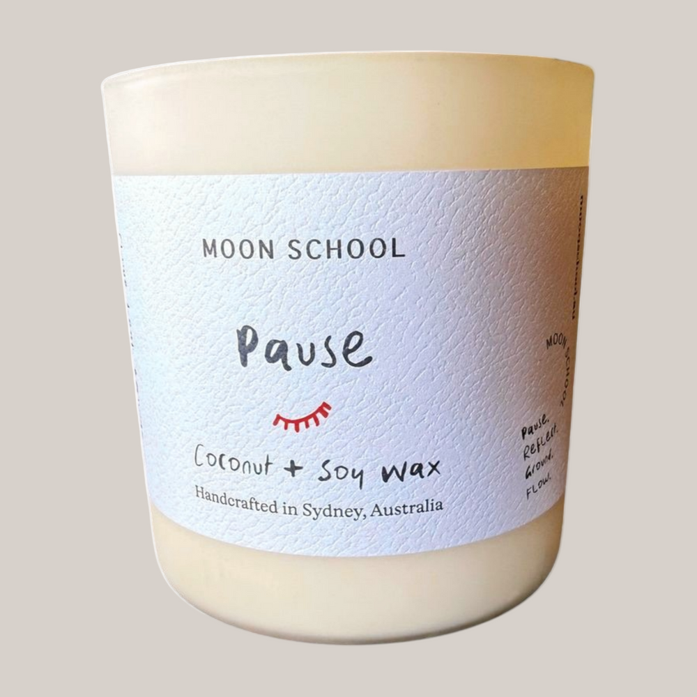 Pause Crystal Candle with 'Moon School' label on a white background