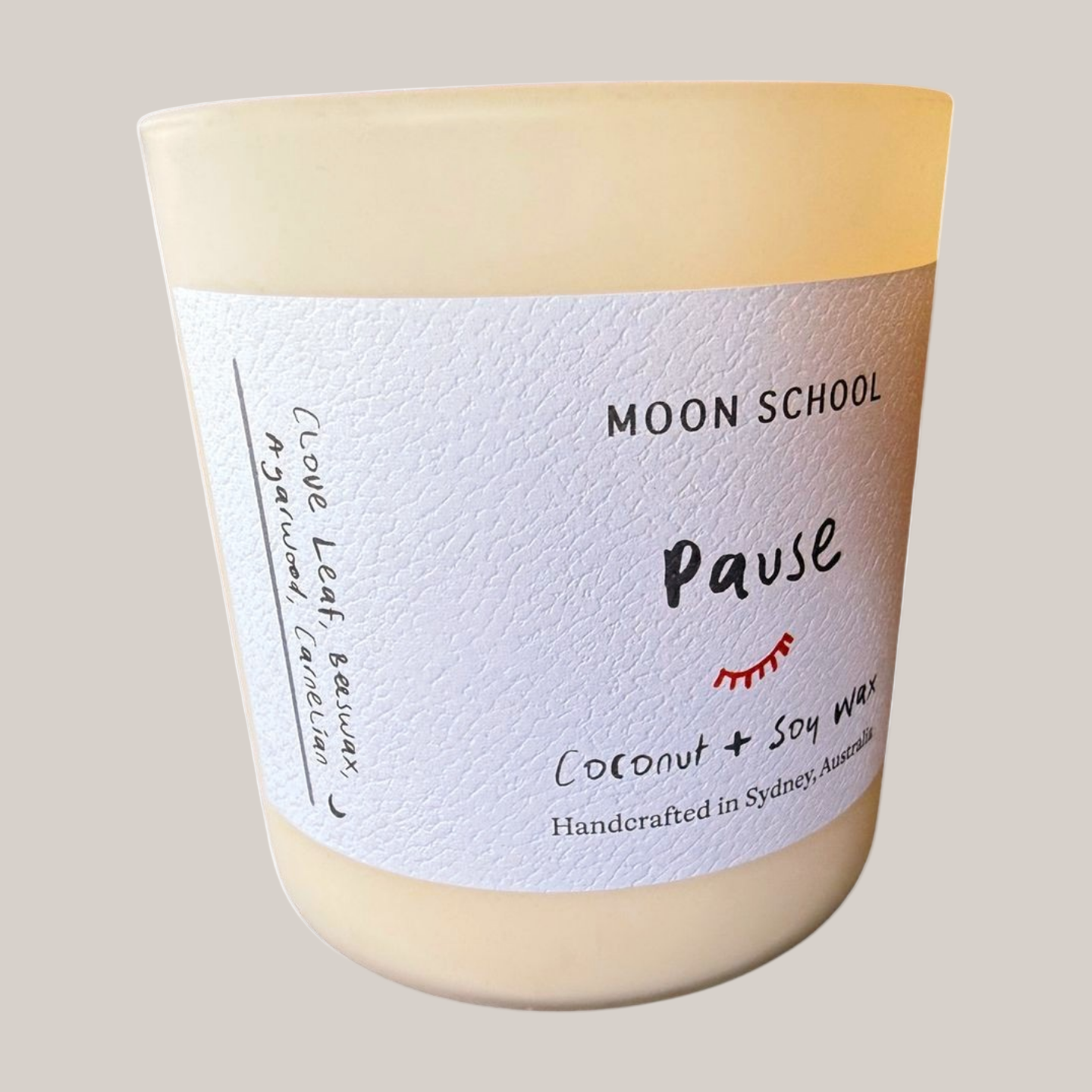 
                  
                    Side view of the Pause Crystal Candle with 'Moon School' label on a white background
                  
                