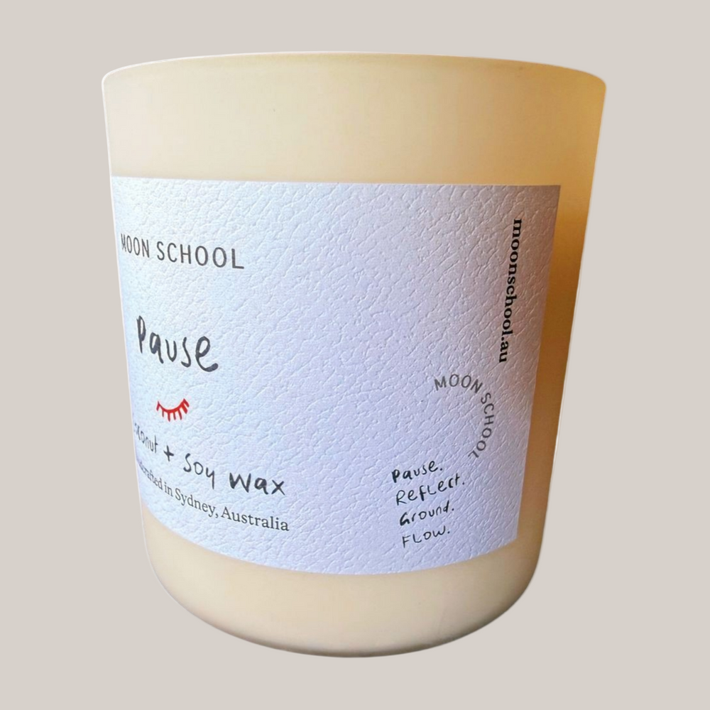 
                  
                    Rightside view of the Pause Crystal Candle with a label on a white background
                  
                