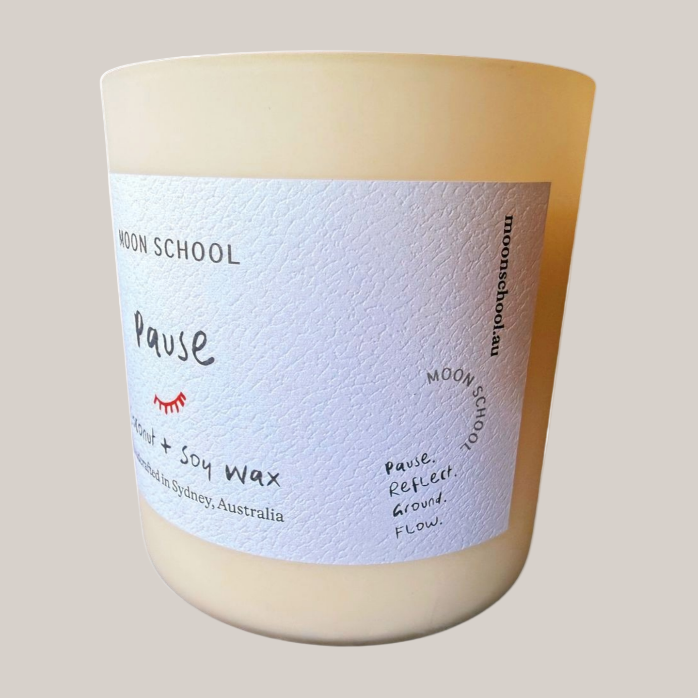 
                  
                    Rightside view of the Pause Crystal Candle with a label on a white background
                  
                