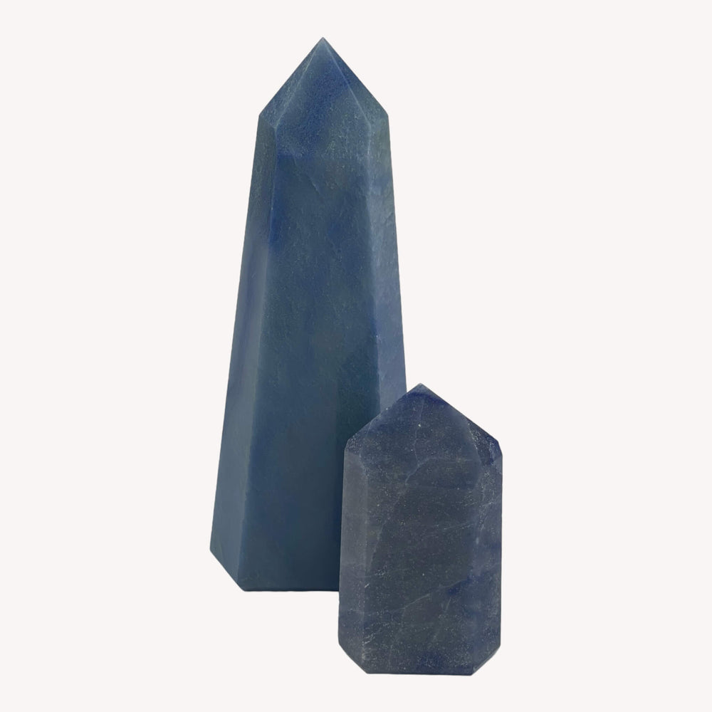 wo Blue Quartz Crystal Generators (Dumortierite) featured in one image, showcasing varied sizes. The rich blue hues and distinctive formations make these generators ideal for enhancing spiritual growth and intuition