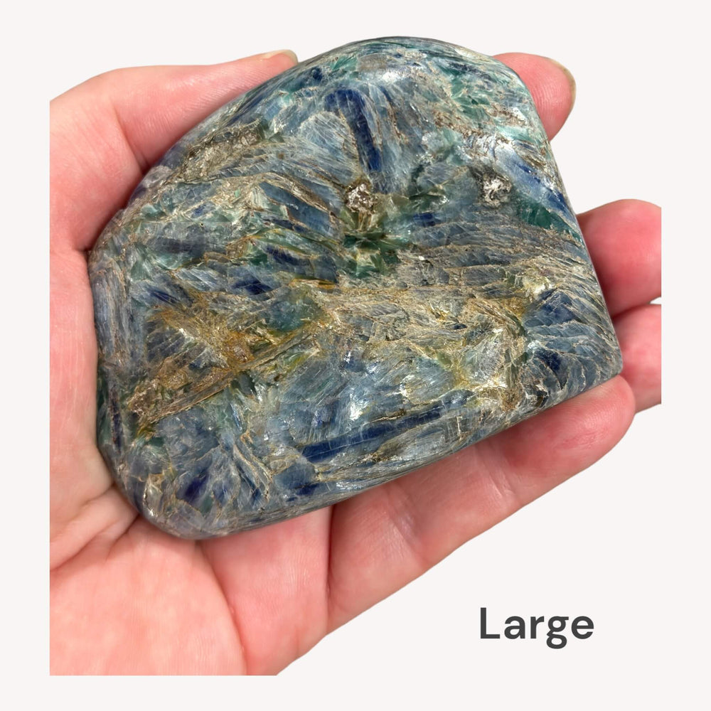 
                  
                    Back view of a single Polished Kyanite piece, revealing its unique textures and natural formations. The deep blue coloration and translucent qualities make it a captivating crystal for meditation and energy work.
                  
                