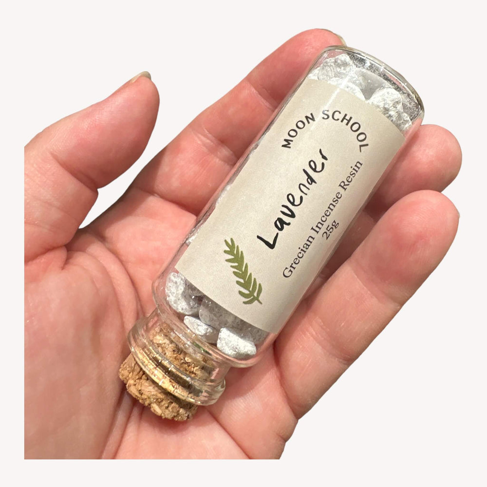 Bottle of Grecian Lavender Incense Resin held in hand. Indulge in the allure of Lavender like never before with this A Grade quality handcrafted elegance. Elevate your space with the exquisite aroma of Lavender, creating a celebration of olfactory bliss with only a small quantity needed.