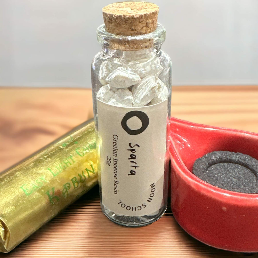 
                  
                    Bottle of 'Sparta' Incense Resin elegantly placed on a bench, accompanied by an incense burner ceramic dish and a roll of Easy-Light Charcoals. Grecian tribute to Spartan valour and resilience. Ideal for infusing your space with strength and a reminder of ancient bravery.
                  
                