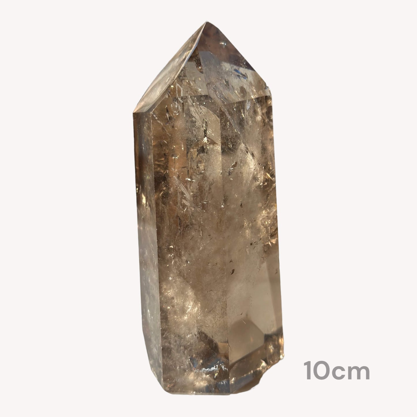  Another side view of the 10cm Smoky Quartz crystal generator, revealing its captivating features.